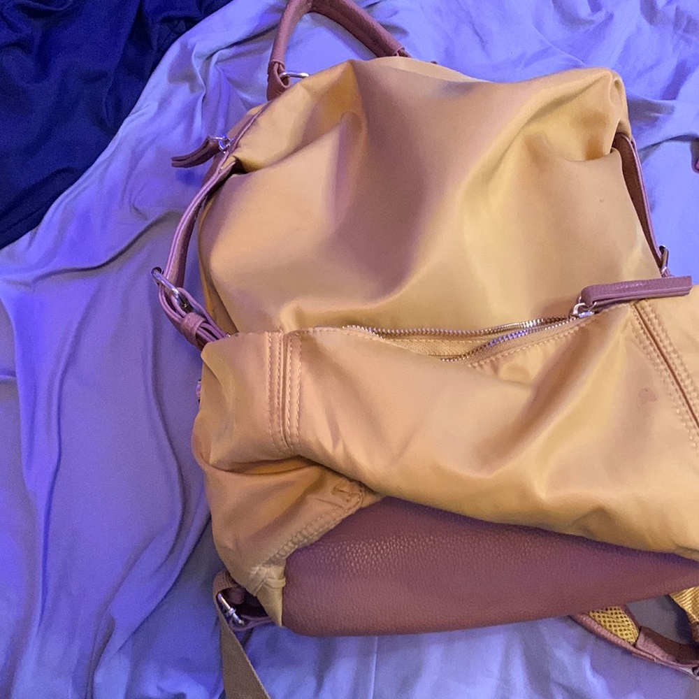 Dark yellow and brown cute bookbag.